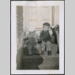 Two boys sitting on stoop (ddr-densho-483-537)