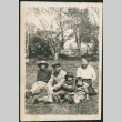 Group sitting on lawn (ddr-densho-293-46)