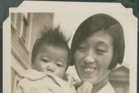 Iku Takahashi holding baby (ddr-densho-355-344)