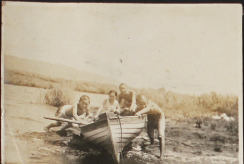 Children launching a boat (ddr-densho-278-72)