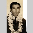 Fumiteru Nakano wearing leis (ddr-njpa-4-1254)