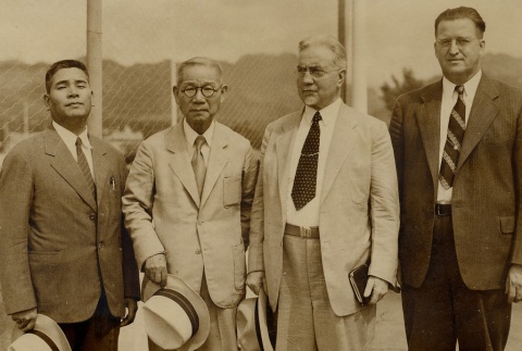 Four men posing for a photograph (ddr-njpa-1-2445)