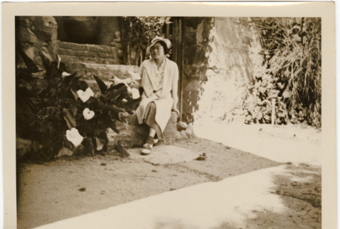 Tomoye (Nozawa) Takahashi sitting on steps (ddr-densho-426-1788)