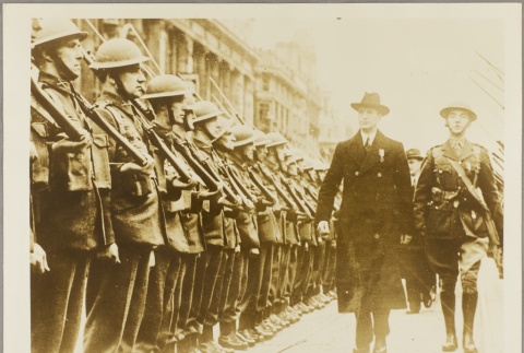 Irish soldiers standing at attention as officers walk by (ddr-njpa-13-1145)