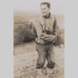 Soldier stands on hill (ddr-janm-17-25)