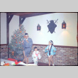 Man and two children performing at party (ddr-densho-426-1174)