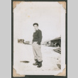 Man stands in the snow (ddr-densho-463-179)