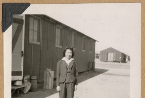Woman outside barracks (ddr-densho-542-240)