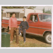 Mitzi Isoshima and Mark Isoshima posing with truck and camper at Ocean Shores (ddr-densho-477-428)