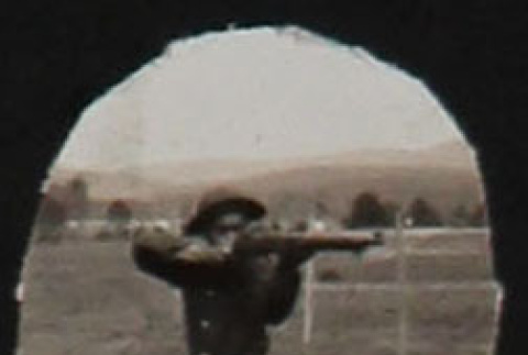 Man with rifle (ddr-densho-287-595)