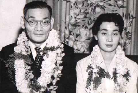 Hisato Ichimada and daughter wearing leis (ddr-njpa-4-115)