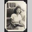 Woman seated on a Rohwer porch (ddr-densho-542-752)