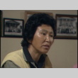 Interview with a woman of the Watsonville Issei Singers, part 2 of 2; interview with unnamed man; b-roll of Kizuka Hall exterior; Monroe Sweetland and Shig Kihara walking (ddr-densho-1007-1661)
