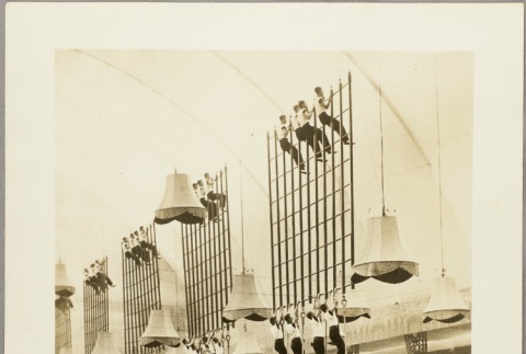 Military cadets performing a rope climbing demonstration (ddr-njpa-13-315)