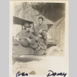 Two men sitting on jeep (ddr-densho-466-357)