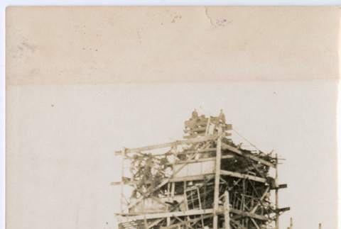 Large structure, men in foreground (ddr-densho-329-1368)