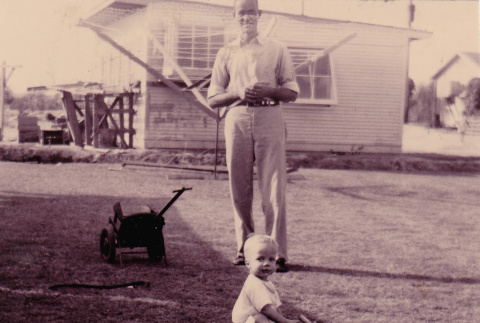 A father and son playing outside (ddr-densho-315-7)