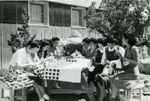 Sewing class at Topaz (Central Utah) concentration camp (ddr-densho-22-464)