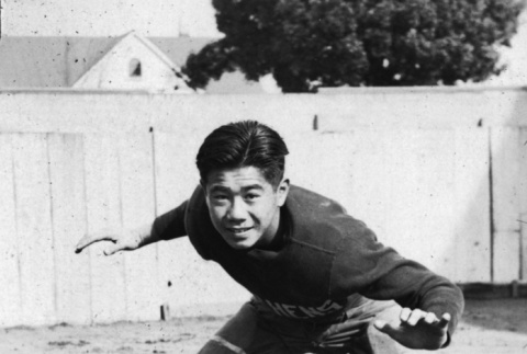 Joe Yoshino in football uniform (ddr-ajah-5-8)