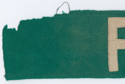 Green fabric with white P (ddr-densho-356-1046)