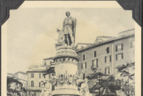 Large statue on pedestal inscribed 