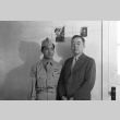 Soldier standing with an unidentified man (ddr-fom-1-369)