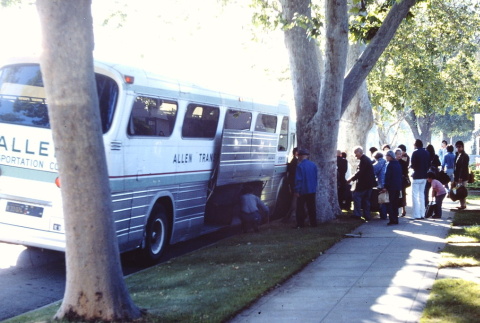 Pilgrims boarding a bus (ddr-densho-294-1)