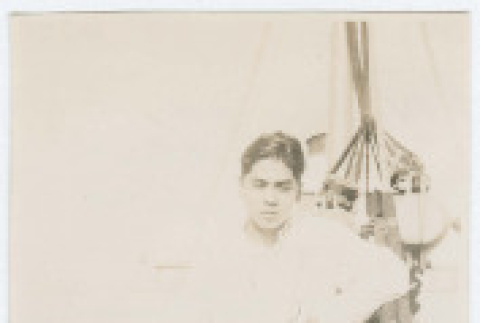 George Tokuda aboard the S.S. Northwestern (ddr-densho-383-421)
