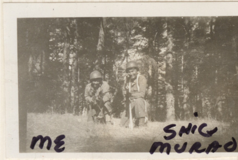 Two men with rifles (ddr-densho-466-271)