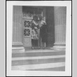 Woman and man standing on steps (ddr-densho-434-493)