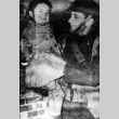 Soldier carrying Japanese American girl (ddr-densho-34-150)