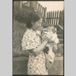 Woman holding a baby (ddr-densho-523-54)