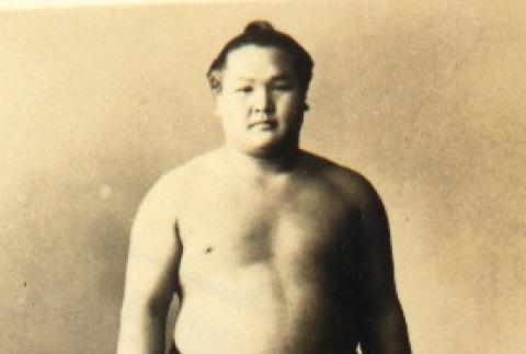 Sumo wrestler posing in mawashi (ddr-njpa-4-527)
