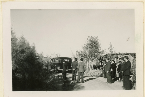 Hearse departing at Mrs. Nakata's funeral (ddr-densho-37-1293)