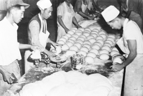 Japanese Americans making bread (ddr-densho-37-241)