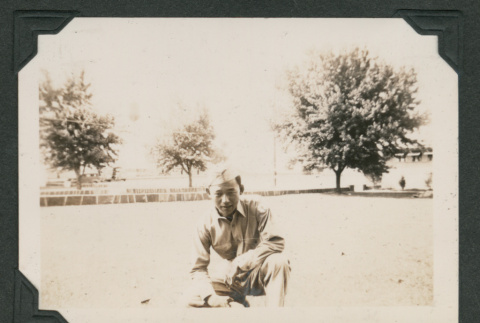 Man crouching (ddr-densho-545-39)