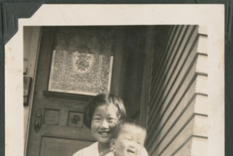 A girl holding her sister (ddr-densho-321-785)