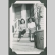 Two women sitting on front steps (ddr-densho-328-165)
