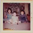 Three girls by Christmas tree (ddr-densho-522-568)