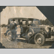 Man and small girl next to car (ddr-densho-483-551)
