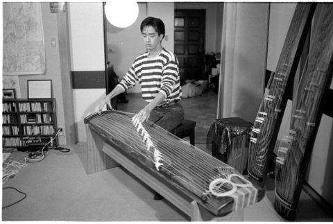 Brian Yamakoshi playing koto (ddr-densho-1007-1324)