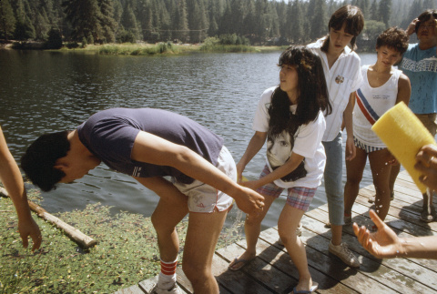 Campers playing games in the lake (ddr-densho-336-1602)