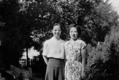 Two women standing in garden (ddr-ajah-6-764)