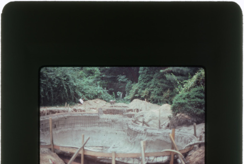 Construction on a pool and rock garden (ddr-densho-377-1138)