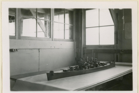 U.S.S. Cleveland model on a table (ddr-densho-37-1098)