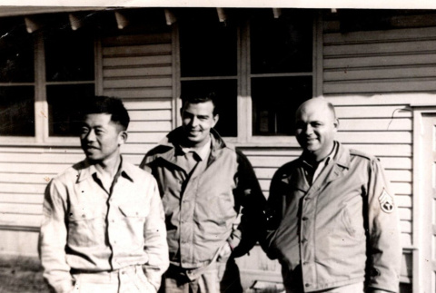 Three men outside building (ddr-densho-563-19)