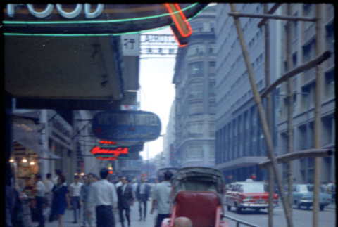 Man and rickshaw on sidewalk by Victoria Hotel (ddr-densho-426-743)