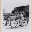 Susan and William Shiomi riding bikes (ddr-densho-522-486)