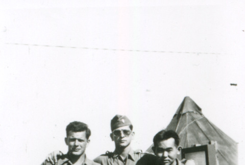 Three soldiers in front of tent (ddr-densho-1007-853)
