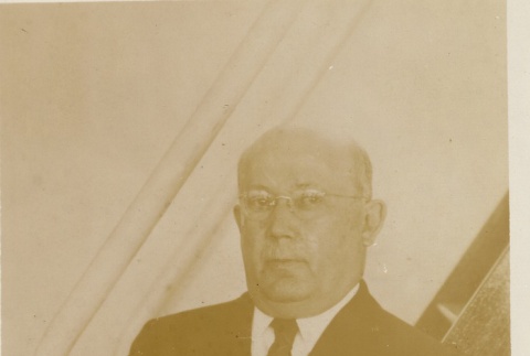 A man standing aboard a ship (ddr-njpa-1-1280)